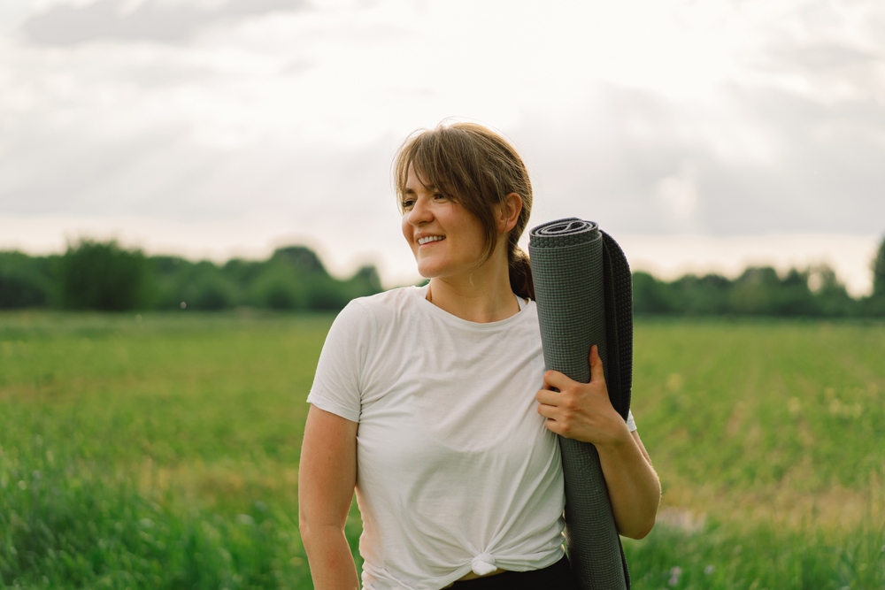 Woman on GLP1s in a field